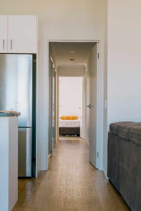 Looking down the hall to the kitchen