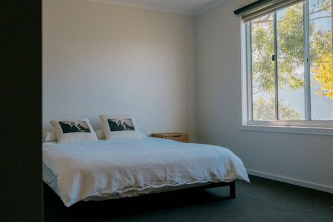 Master bedroom with queen bed, ensuite and walk-in robe